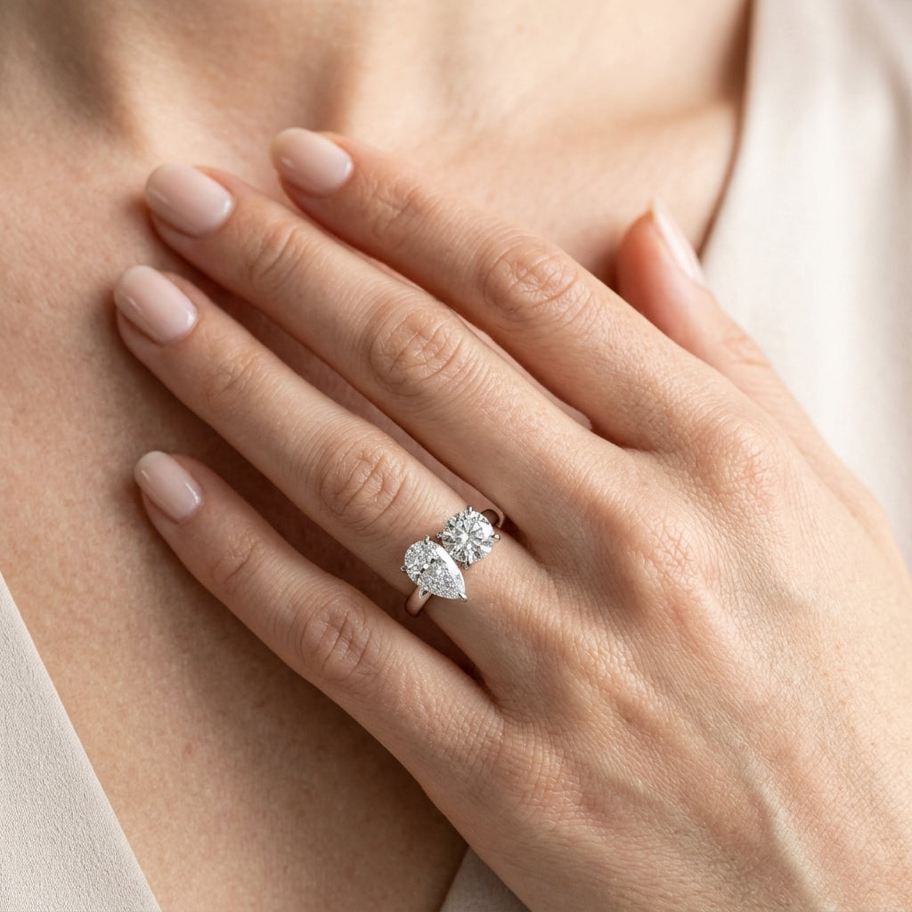 2-Stone Round & Pear Engagement Ring - worn lifestyle photo