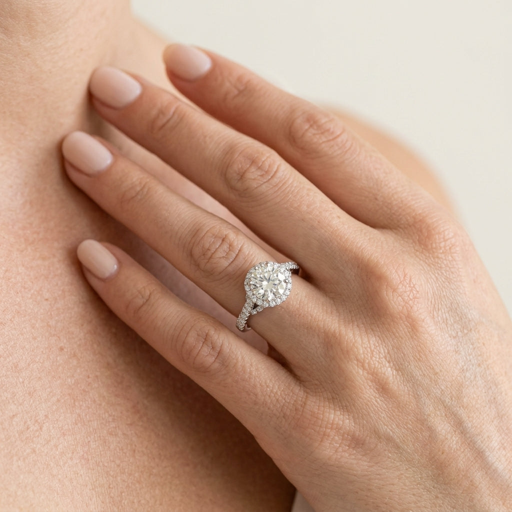 Single Row Hidden Halo Engagement Rings - worn lifestyle photo