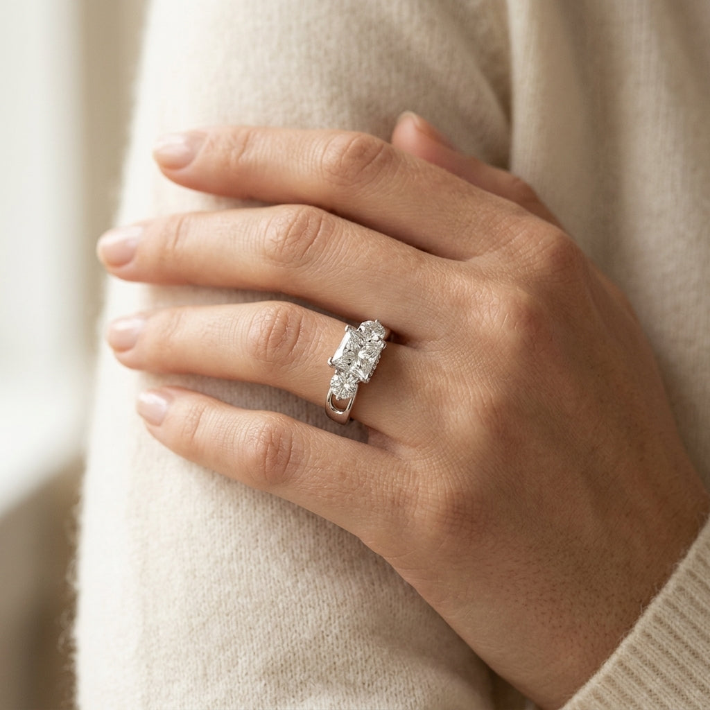 3-Stone Hidden Halo Engagement Ring - worn lifestyle photo