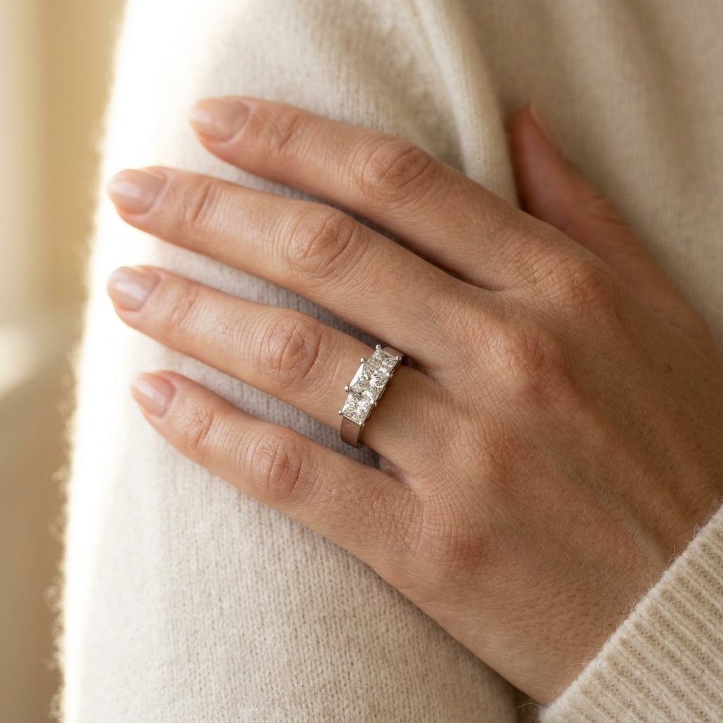 ENGAGEMENT RINGS 3 STONE PRINCESS - worn lifestyle photo