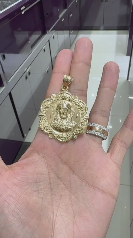 10k yellow gold Jesus pendant