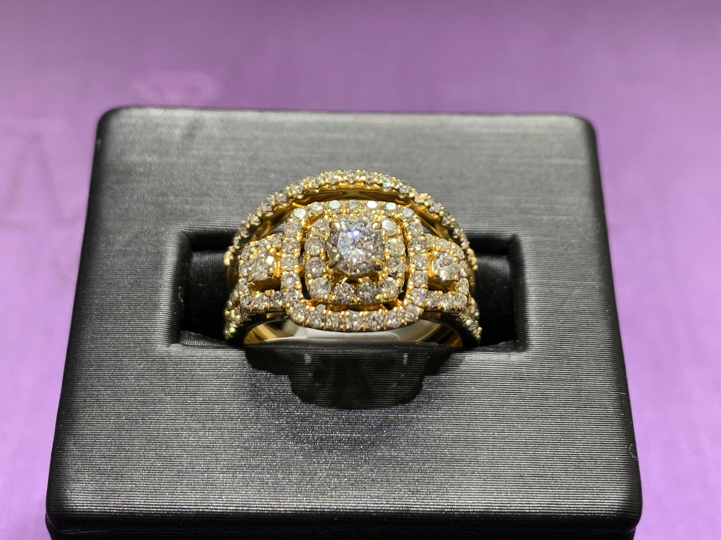 14kt yellow and 1.00ctw  with 2 halo plus wedding band with round diamonds and yellow gold