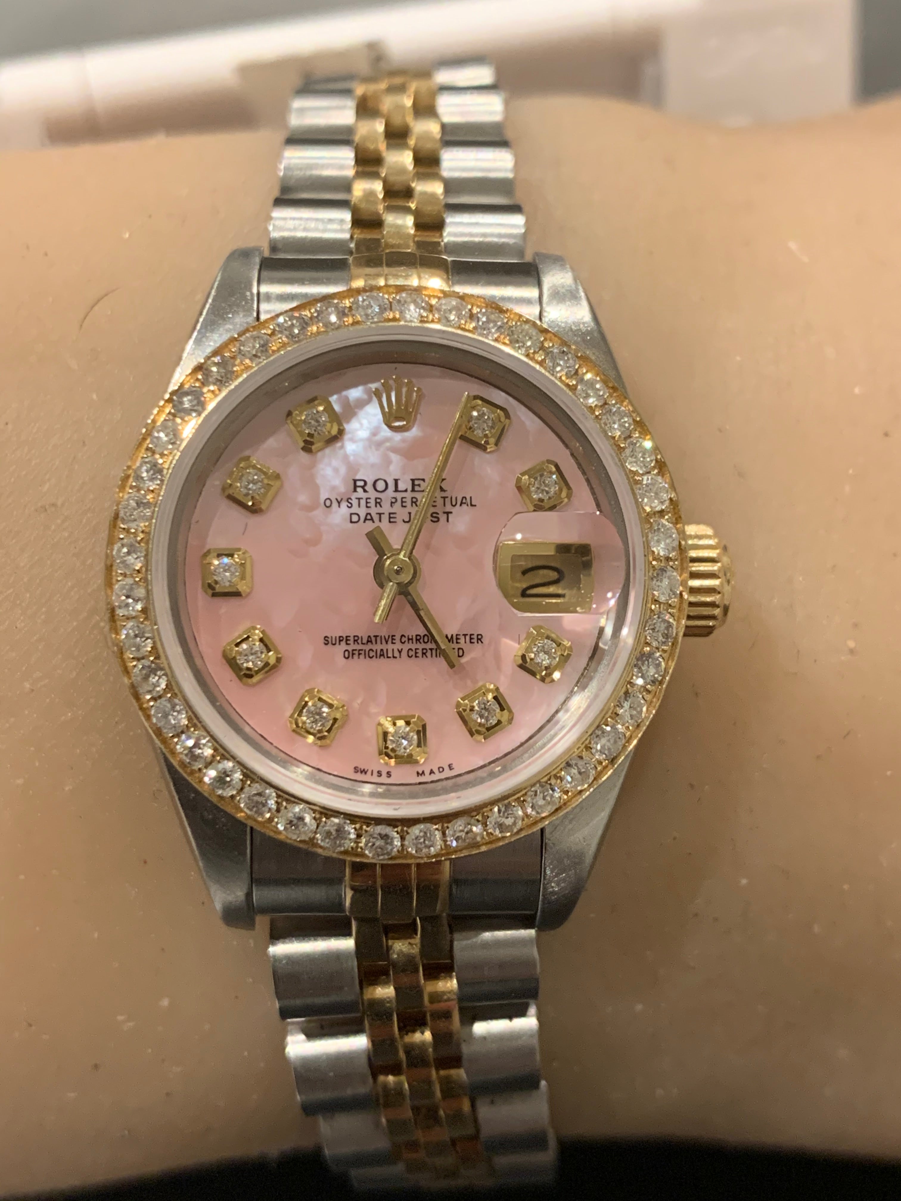 Ladies rolex with pink on sale face