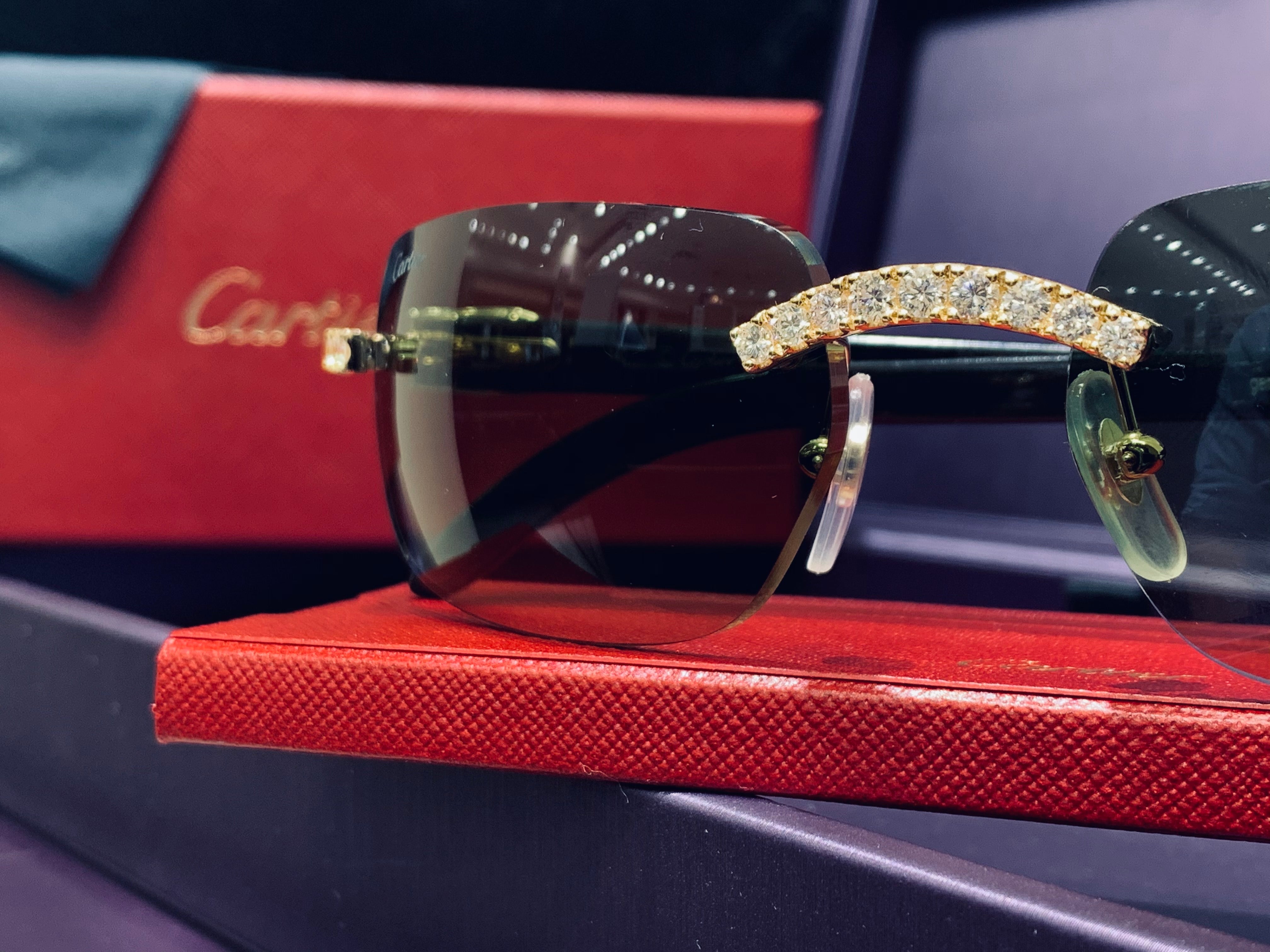 Cartier sunglasses best sale black and gold