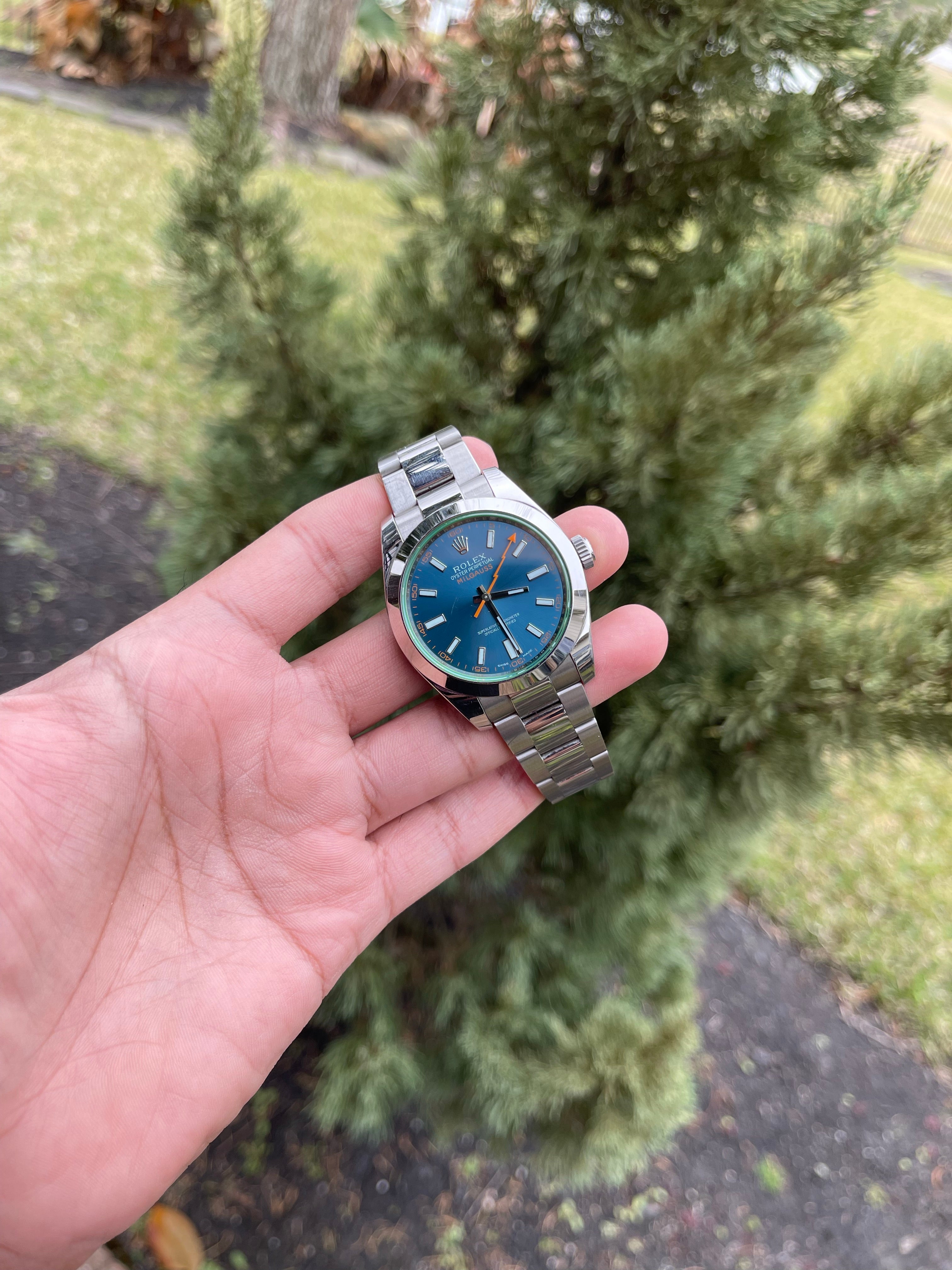 Rolex milgauss blue deals dial green crystal