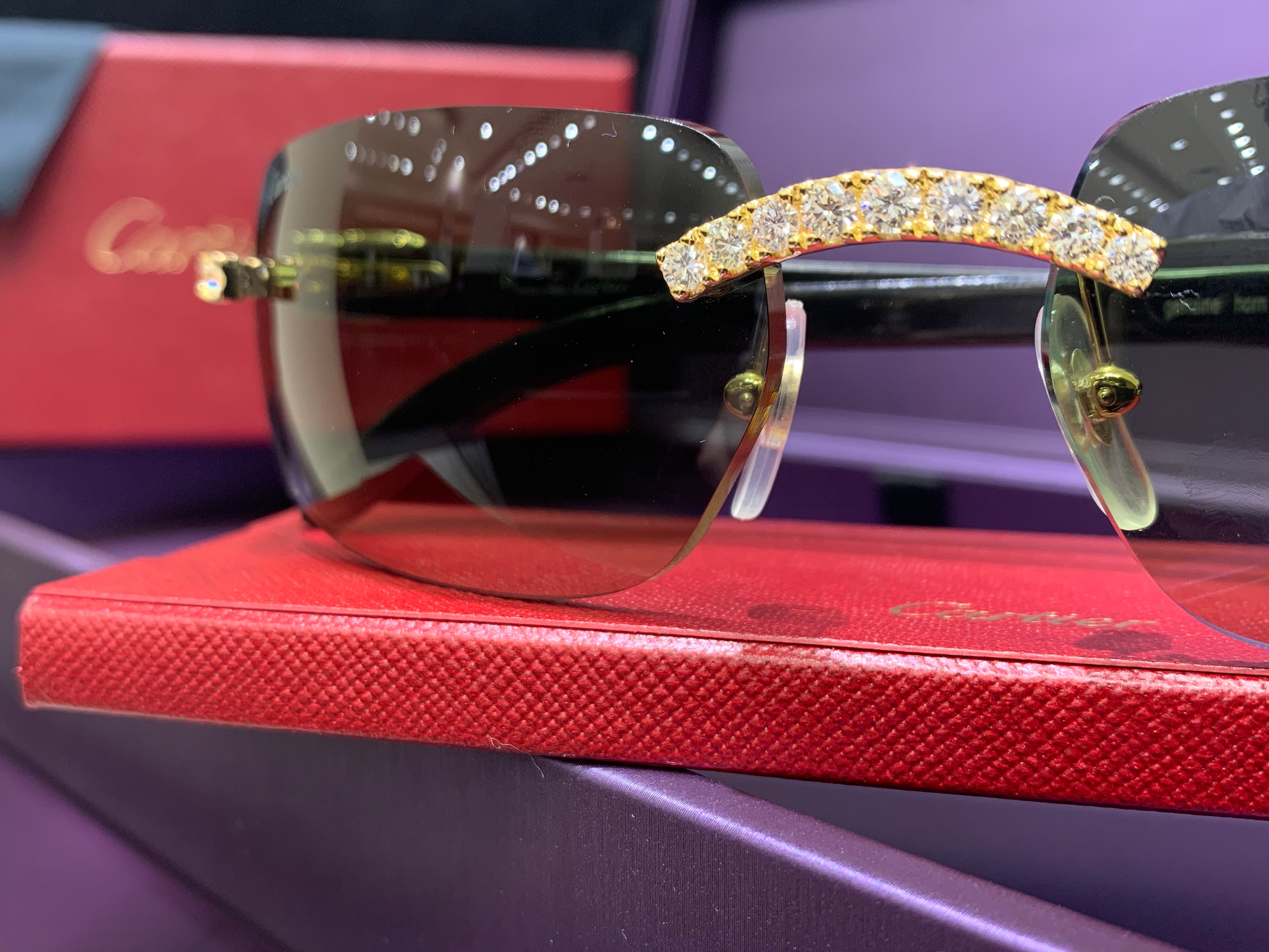 Cartier buffalo horn glasses with sale diamonds